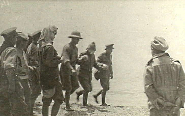 22 May 1915 - Turkish envoy led on beach to HQ for burial truce - per AWM G00991