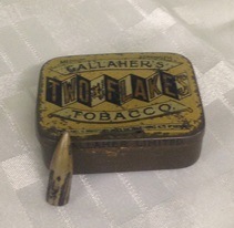 Hector Miller's bullet and tobacco tin